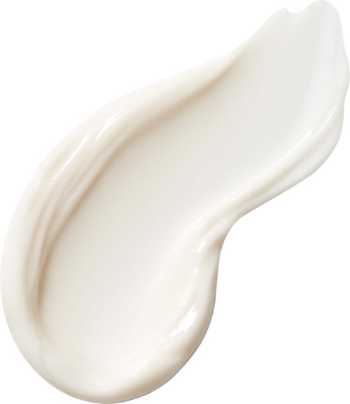 Een crèmige witte substantie, glad en dik, mogelijk lotion of crème, gestreken op een witte achtergrond.