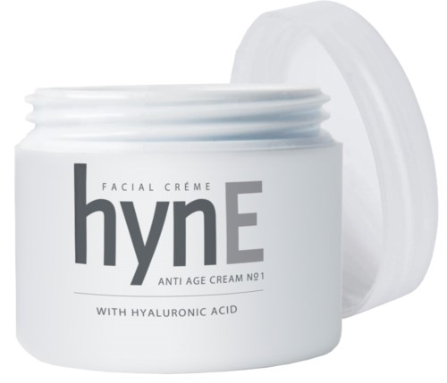 En vit krämburk med grå text och lock, märkta 'hyE,' med ingredienser inklusive hyaluronsyra.