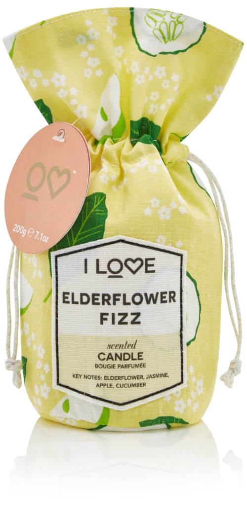 Gul och grön tygpåse med etikett för fläderblomssprudlande doftlampa.