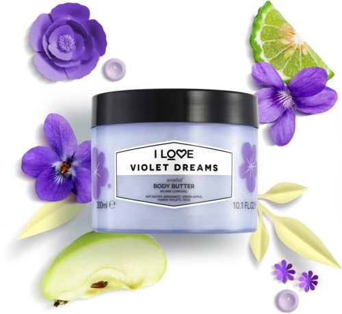 Purple flowers, lime, cucumber, and body butter jar arranged artistically.