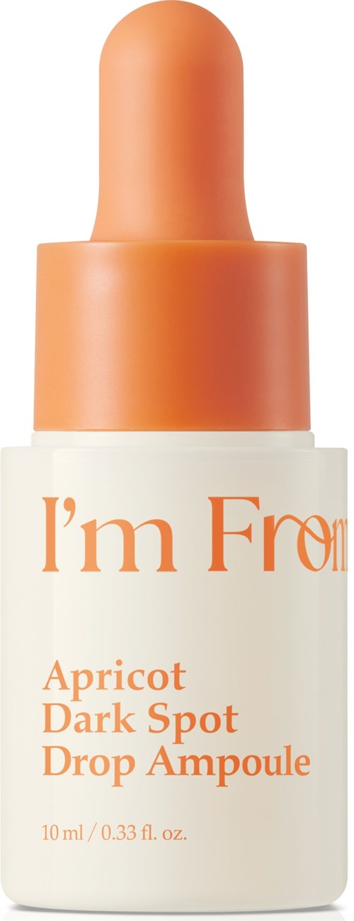 Kleine fles met druppelaar, gemarkeerd 'I'm F' en 'Apricot Dark Spot Drop Ampoule,' bevat huidverzorging.