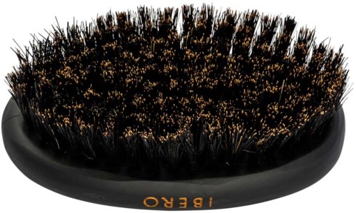 A black brush with densely packed bristles and the word 'IBERO' on the base.