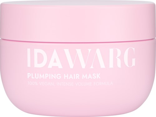 Rosa runt förpackning med vit text: IDAWARG, Plumping Hair Mask, vegansk, för volym.