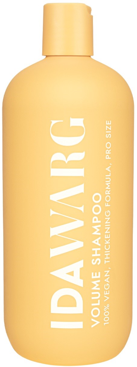 Eine große, gelbe Shampoo-Flasche mit dem Label "IDAVAR CG" für dickere Haare, mit zusätzlichem weißen Text.
