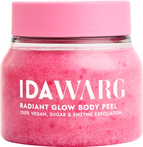 Pinkki purkki IDAWARG Radiant Glow Body Peel -tuotteelle, jossa vaaleanpunainen kansi, merkattu vegaaniseksi ja entsyymikuorinnaksi.