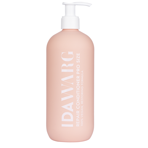 rosa flaske med pumpe, merket 'IDAVIRG REPAIR CONDITIONER PRO SIZE.'