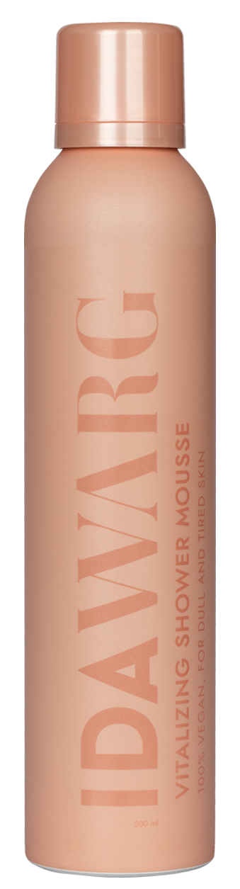 Een lang, roze fles met dop, gemarkeerd met 'IDAYARC' en 'VITALIZING SHOWER MOUSSE'.