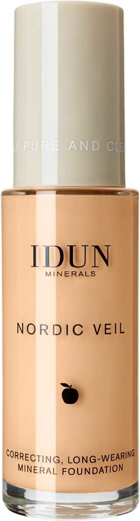 En foundationflaska märkt 'IDUN MINERALS' med 'NORDIC VEIL', i beige färg med vit lock.