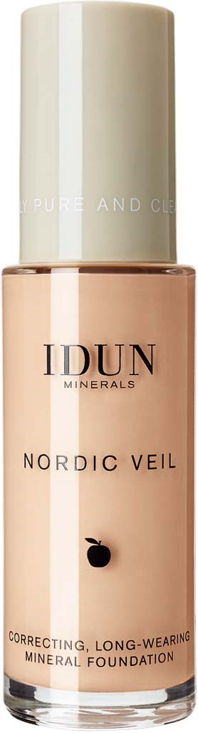 En flaske med IDUN Cosmetics foundation med beige væske og hvit hette.