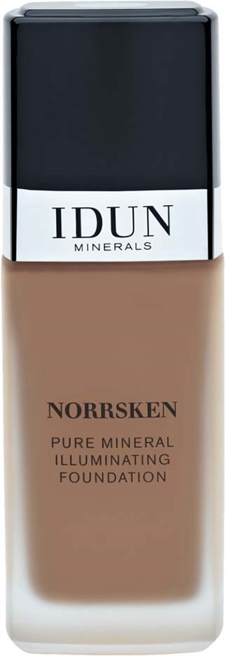 En flaske med IDUN Minerals Norsksen foundation med svart caps og beige væske inni.