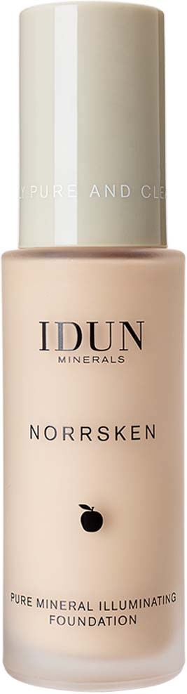 Flesje IDUN Norrsken verhelderende foundation, lichtgekleurde vloeistof in een witte fles met zwarte tekst.