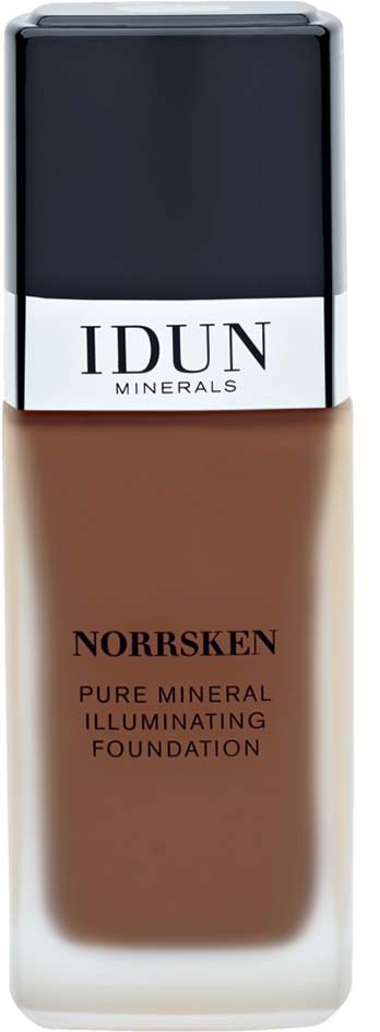Een fles IDUN Minerals Norrsken foundation met zwarte dop en bruine inhoud.