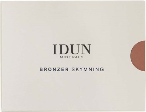 Bilden visar en box av IDUN Minerals Bronzer Skymning med en minimalistisk vit design och en liten brun cirkel.