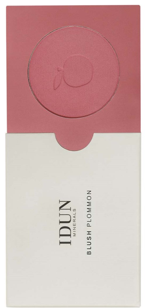 Blush i rosa farge med et rundt preget design, i en hvit og rosa eske.