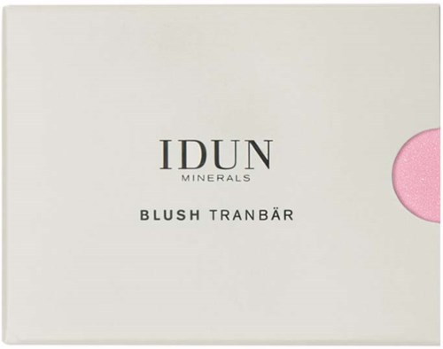 En vit ask med svart text för IDUN Minerals blush i rosa färg, delvis synlig på höger sida.