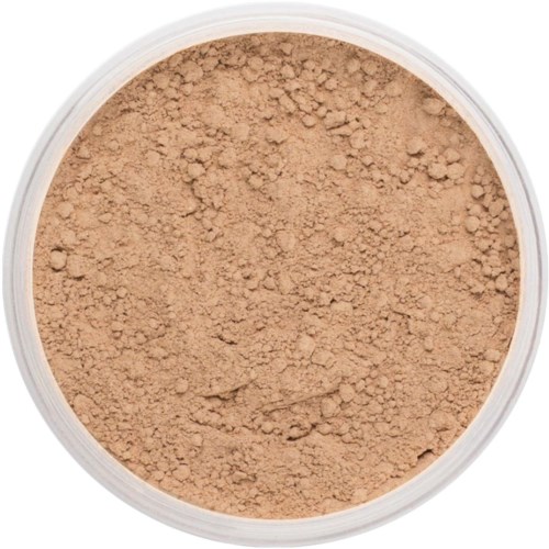 Ljus beige löspuder i en klar behållare.