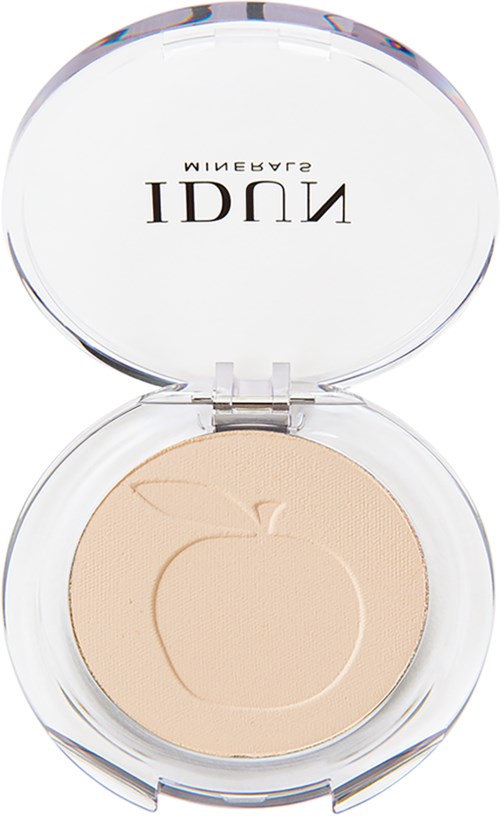 A compact powder case with a clear lid, featuring a peach logo of a peach fruit on the powder.