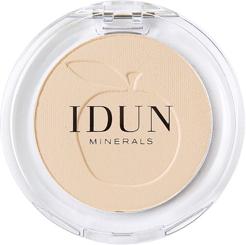 A compact with beige powder and the words IDUN Minerals on the lid.