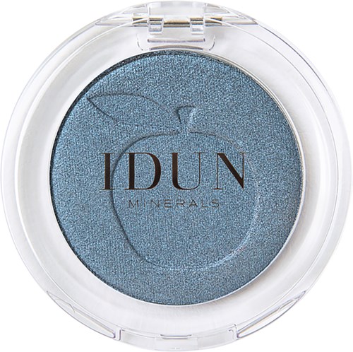 A round eyeshadow container with blue shimmering contents and the brand name IDUN MINERALS on it.