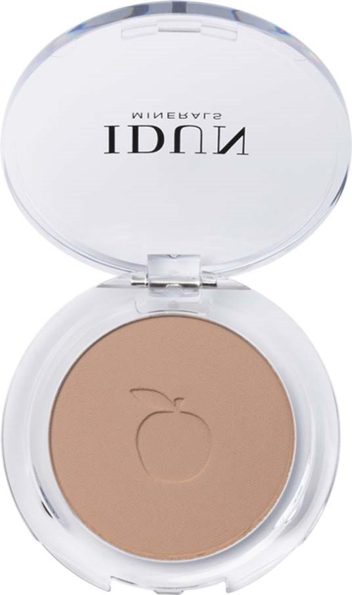 En kompakt sminke med speil, inneholder beige pulver med et epleikon. Merket er på lokket.