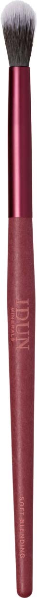 En sminkebørste med mørke børstehår og rosa håndtak.