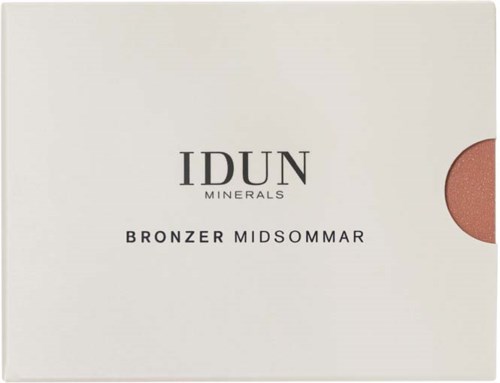 Een witte doos met zwarte tekst zegt IDUN MINERALS BRONZER MIDSUMMAR, met een ronde roze bronzer zichtbaar aan de zijkant.