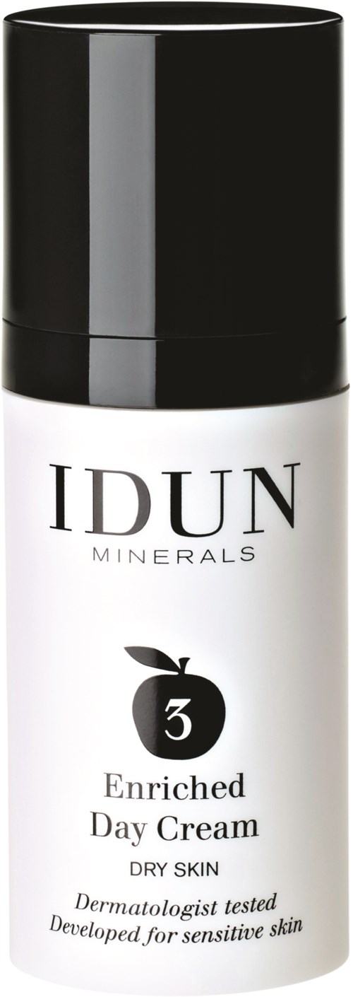 En vit flaska med svart lock märkt IDUN Minerals, berikad dagkräm för torr och känslig hud, dermatologtestad.