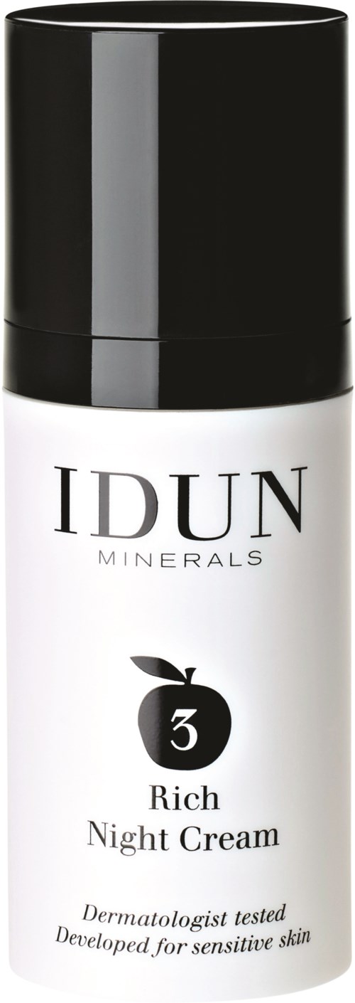 En hvit flaske med svart lokk merket 'IDUN MINERALS Rich Night Cream' for sensitiv hud.