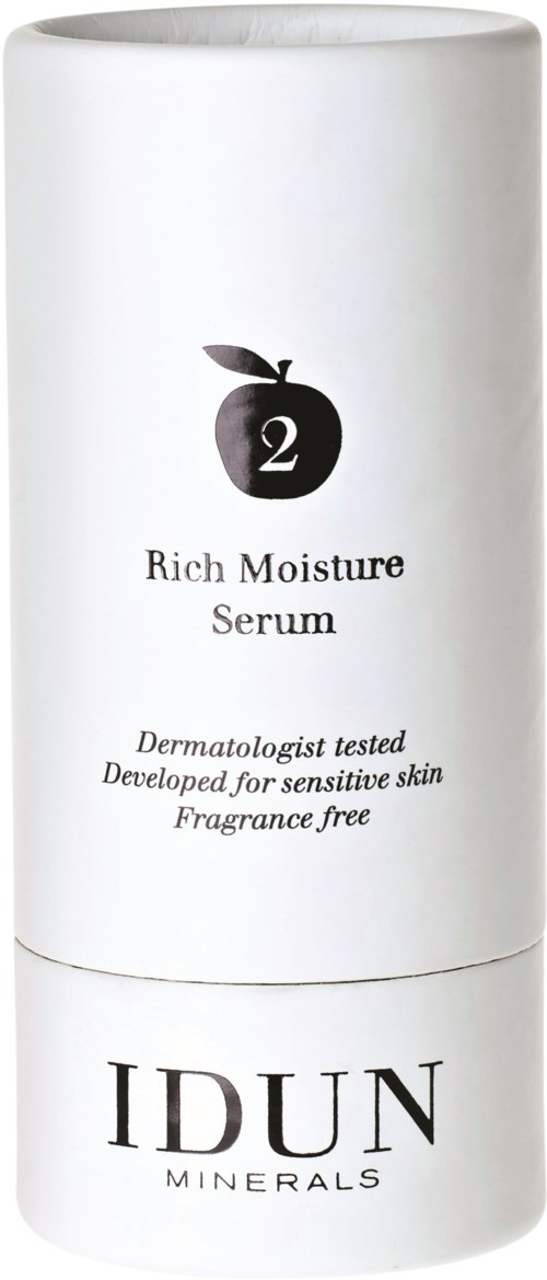 En vit flaska med svart text erbjuder rik fuktgivande serum, för känslig hud, doftfri, dermatologtestad, av IDUN Minerals.