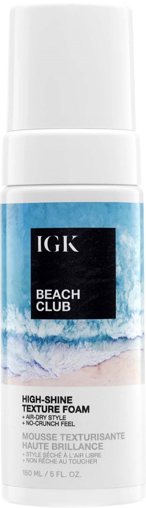 En hvit sprayboks med en blå havsscene på etiketten, med ordene 'IGK BEACH CLUB' og 'TEXTURE FOAM'.