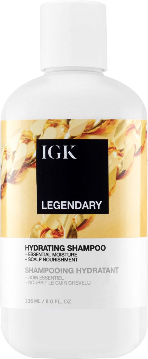 Eine weiße Flasche IGK Legendary Hydrating Shampoo mit goldener und schwarzer Beschriftung.