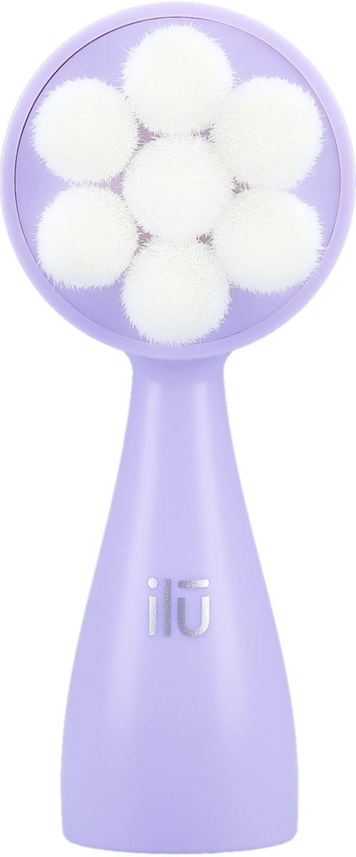 A purple facial cleansing brush with white soft sponges inside. The handle has a small logo or symbol.