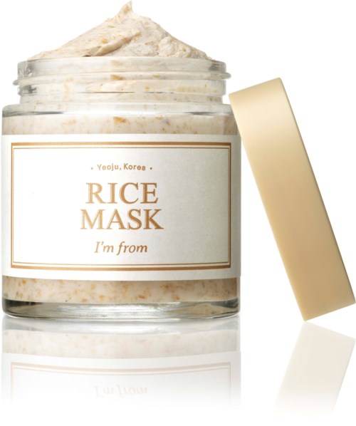 Ett glas med rice mask-kräm, märkt 'Yeoju, Korea' och 'I'm from,' med locket lutande bredvid.