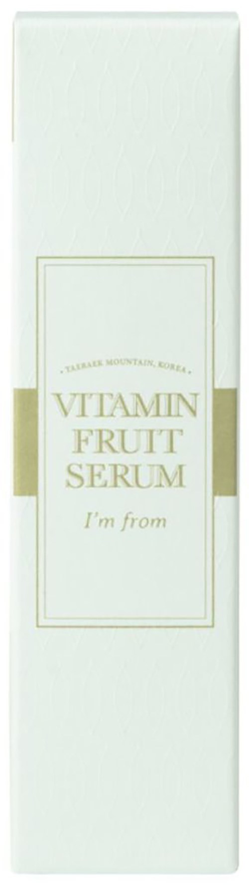 Een lange, witte doos met gouden letters zegt 'Vitamin Fruit Serum'.