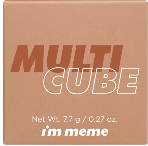 En beige kasse mærket 'MULTI CUBE' med nettovægt 7,7 gram, og en sætning 'im meme' i bunden.
