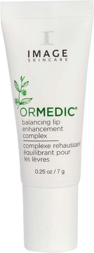 A white tube of skincare product called ORMEDIC balancing lip enhancement complex with green leaves design.