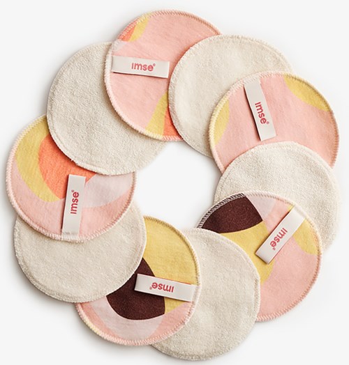 Mjuka runda make-up-removers som har pastell- och abstrakta mönster, vissa är märkta med varumärket "imse".