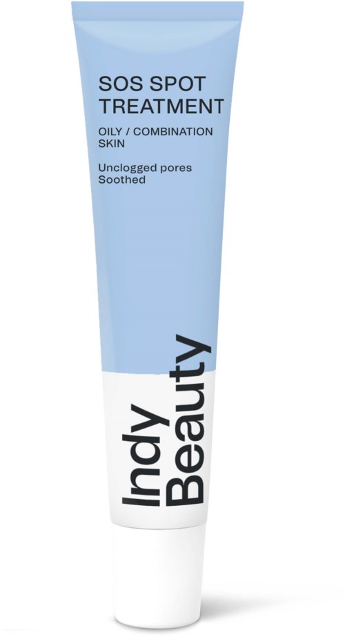 En blå och vit tub märkt 'SOS SPOT TREATMENT' för fet hud, lugnar osamlade porer, från Indy Beauty.