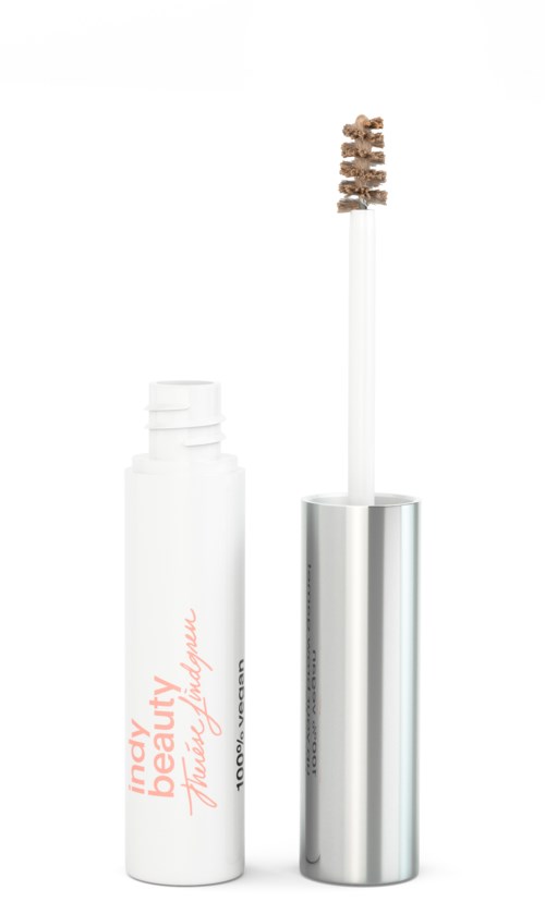 En vit flaska med silvrigt lock och en borste med brunt mascara.