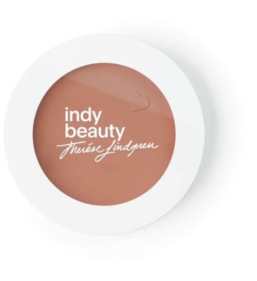 Logo med orden 'indy beauty' och 'Théèse Lindgren' i vitt, på en brungul cirkelbakgrund. En vit yttercirkel omger det.