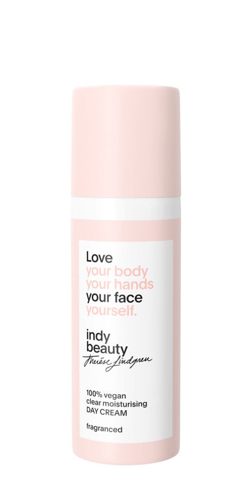 Valkoinen ja vaaleanpunainen päivävoidepullon Indy Beauty, vegaani ja tuoksuton.