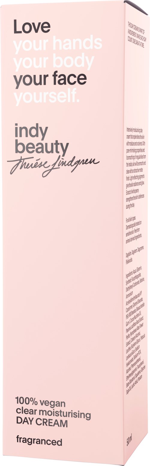 Ljusrosa förpackning av Indian Beauty-fuktkräm med text om att älska ansikte och kropp, vegansk, parfymfri, dagkräm.