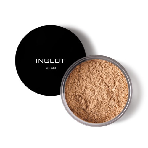 A container of beige powder with a black lid that says 'INGLOT' and 'EST. 1983'.