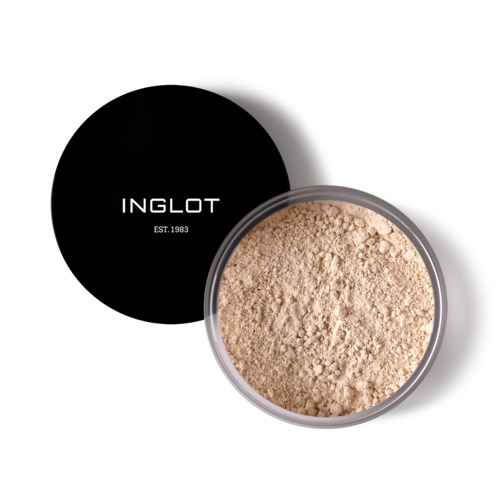 A jar of beige powder with a black lid that says "INGLOT" and "EST. 1983".