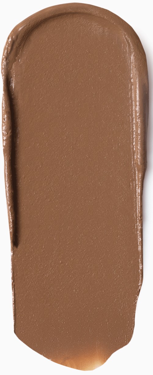 A brown, elongated, oval-shaped object with a smooth, glossy surface. It looks like a chocolate or caramel treat.
