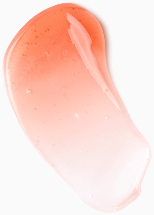 A pinkish, semi-transparent gel with a smooth, curved shape and some bubbles inside.