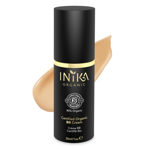 En svart flaska från INIKA Organic certifierad ekologisk BB-kräm med en klick beige kräm bakom.