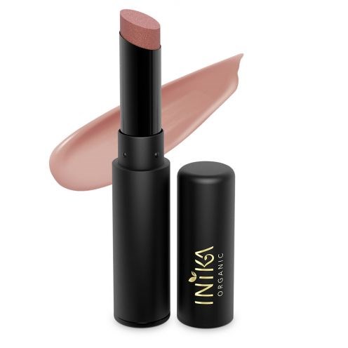 Ett svart läppstift med ett beige lipstick-stift, ett ljusrosa-beige streck, och ett svart lock med guldig text.