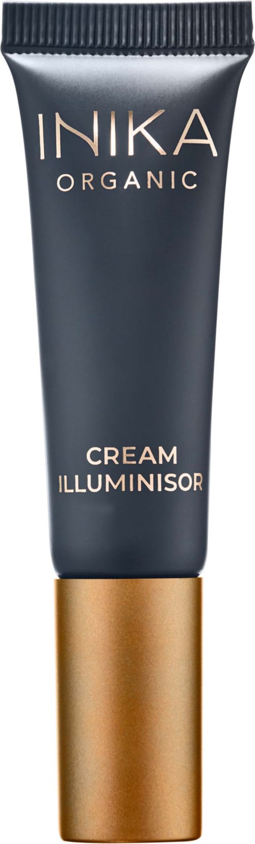 Eine dunkle Tube mit goldener Kappe, beschriftet 'INIKA Organic Cream Illuminator,' für Make-up zum Aufhellen der Haut.