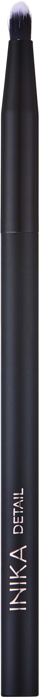 A black pencil with white text that says 'NIKKA DETAIL' on it.